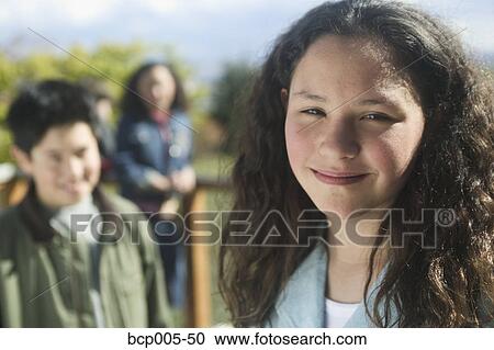 Outdoor portrait of a teenage girl. View Large Photo Image Stock Image - Outdoor portrait of a teenage girl.. Fotosearch