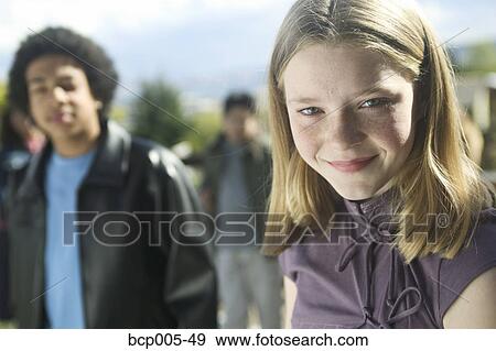 Stock Photo - Outdoor portrait of a teenage girl.. Fotosearch
