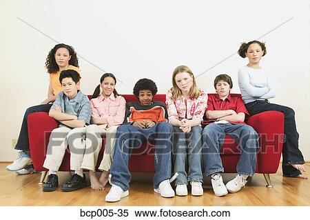 Seven teenage kids hanging out together. View Large Photo Image Stock Photography - Seven teenage kids hanging out together. . Fotosearch