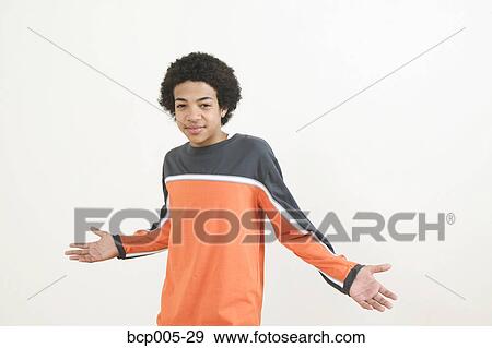 Studio portrait of a teenage boy. View Large Photo Image Stock Photo - Studio portrait of a teenage boy. . Fotosearch