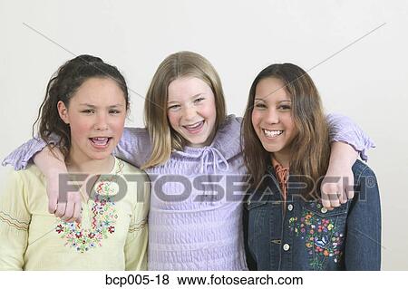 Studio portrait of three teenage friends. View Large Photo Image Stock Photo - Studio portrait of three teenage friends.. Fotosearch