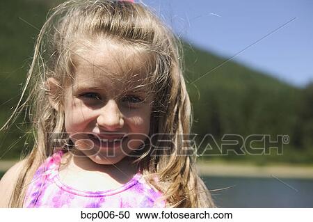 Stock Image - Portrait of a young girl.. Fotosearch