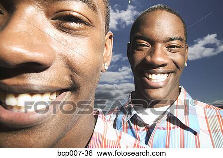 Portrait of twin teenage boys. View Large Photo Image Stock Photograph - Portrait of twin teenage boys.. Fotosearch