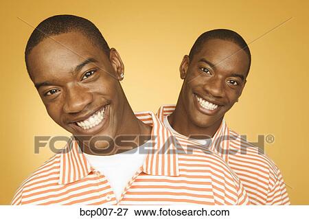 Studio portrait of twin teenage boys. View Large Photo Image Stock Photo - Studio portrait of twin teenage boys.. Fotosearch