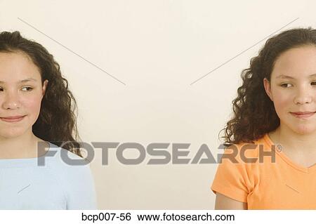 Twin teenage girls. View Large Photo Image Stock Photograph - Twin teenage girls.. Fotosearch