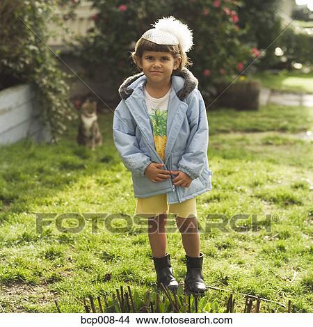 Girl wearing a party hat. View Large Photo Image Picture - Girl wearing a party hat.. Fotosearch