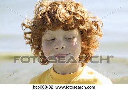Portrait of a young red-headed boy. View Large Photo Image Stock Image - Portrait of a young red-headed boy.. Fotosearch