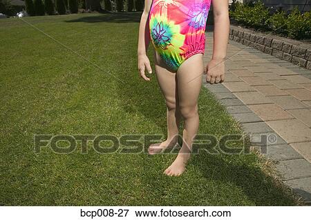 Young girl in a tie-dye bathing suit. View Large Photo Image Stock Photo - Young girl in a tie-dye bathing suit.. Fotosearch
