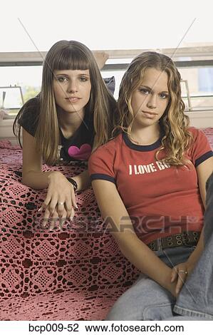 Stock Image - Portrait of two teenage girls.. Fotosearch