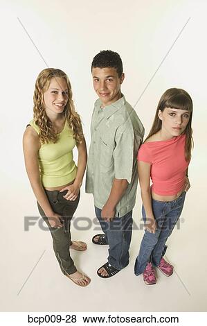 Studio portrait of three teens. View Large Photo Image Stock Photo - Studio portrait of three teens.. Fotosearch