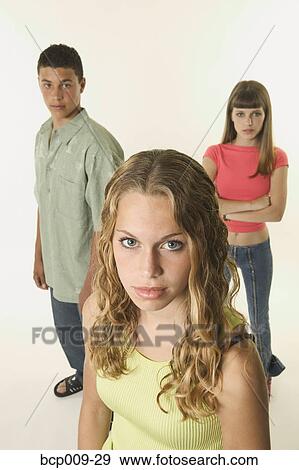 Studio portrait of three teens. View Large Photo Image Stock Photo - Studio portrait of three teens.. Fotosearch