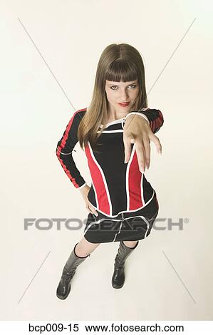 Teenage girl pointing at the camera. View Large Photo Image Stock Photography - Teenage girl pointing at the camera.. Fotosearch