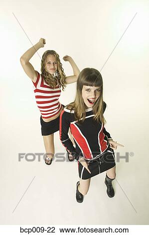Teenage girls dancing in a studio. View Large Photo Image Stock Image - Teenage girls dancing in a studio.. Fotosearch