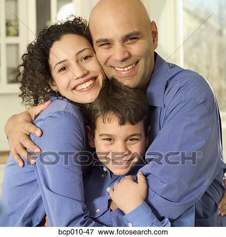 Stock Photo - Parents with their young son.. Fotosearch