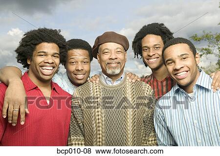 Portrait of a father and his four grown sons. View Large Photo Image Stock Photo - Portrait of a father and his four grown sons.. Fotosearch
