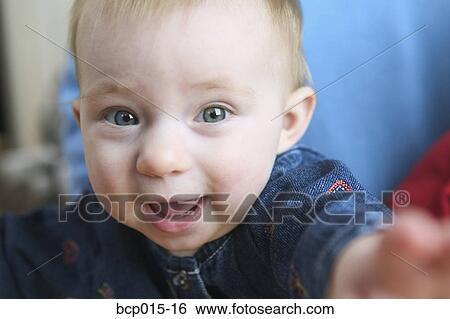A baby girl pale blue eyes. View Large Photo Image Stock Photograph - A baby girl pale blue eyes.. Fotosearch