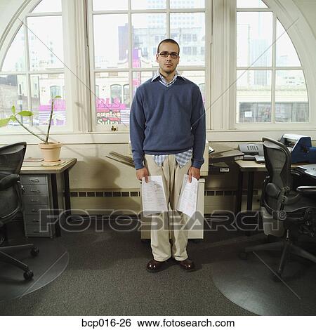 A sad man in front of a copy machine. View Large Photo Image Stock Photograph - A sad man in front of a copy machine.. Fotosearch
