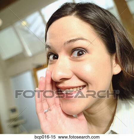 Stock Photography - Young woman gossiping.. Fotosearch
