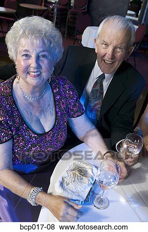 Stock Photo - A senior couple out for the evening.. Fotosearch