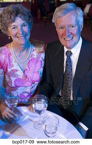 Stock Photo - A senior couple out for the evening.. Fotosearch