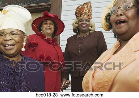 Four senior women wearing hats and singing on church steps. View Large Photo Image Stock Photo - Four senior women wearing hats and singing on church steps.. Fotosearch