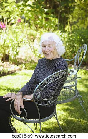 Outdoor portrait of a senior woman. View Large Photo Image Stock Photo - Outdoor portrait of a senior woman.. Fotosearch