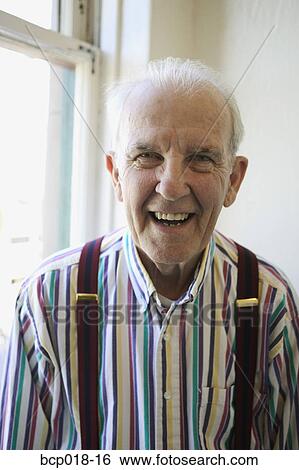 Portrait of a senior man wearing suspenders. View Large Photo Image Stock Photograph - Portrait of a senior man wearing suspenders.. Fotosearch