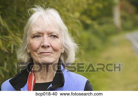Portrait of a senior woman outdoors. View Large Photo Image Stock Image - Portrait of a senior woman outdoors.. Fotosearch