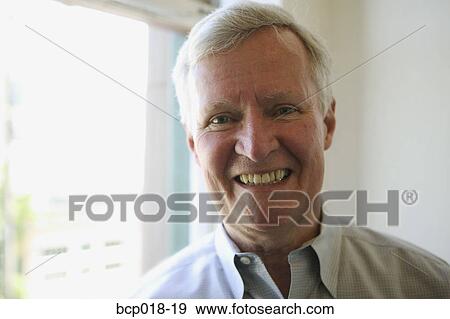 Portrait of a smiling senior man. View Large Photo Image Stock Photo - Portrait of a smiling senior man.. Fotosearch