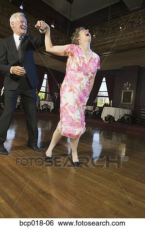 Senior couple on the dance floor. View Large Photo Image Stock Photograph - Senior couple on the dance floor.. Fotosearch