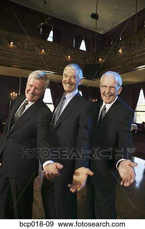 Three senior men holding out their hands on the dance floor. View Large Photo Image Stock Photo - Three senior men holding out their hands on the dance floor.. Fotosearch