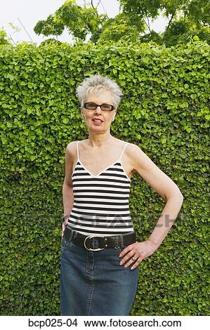 A hip middle-aged woman View Large Photo Image Picture - A hip middle-aged woman. Fotosearch