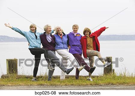 Five smiling middle-age women View Large Photo Image Stock Photo - Five smiling middle-age women. Fotosearch