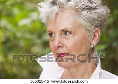 Stock Photography - Headshot of a middle-aged woman. Fotosearch