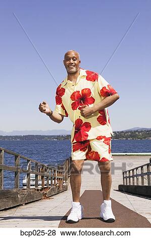 Middle-aged man dancing View Large Photo Image Stock Photo - Middle-aged man dancing. Fotosearch