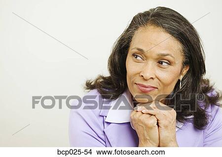 Portrait of a middle-aged woman View Large Photo Image Picture - Portrait of a middle-aged woman. Fotosearch