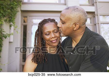 Portrait of affectionate middle-aged man and woman View Large Photo Image Stock Photography - Portrait of affectionate middle-aged man and woman. Fotosearch