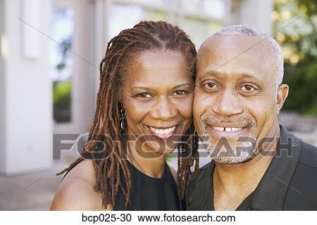 Portrait of middle-aged man and woman View Large Photo Image Stock Image - Portrait of middle-aged man and woman. Fotosearch