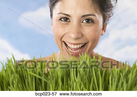 Woman and wheat grass View Large Photo Image Stock Photo - Woman and wheat grass. Fotosearch