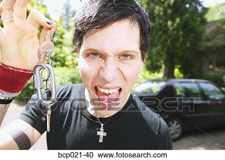 A punky male and his car keys View Large Photo Image Stock Image - A punky male and his car keys. Fotosearch