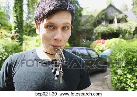 A punky male and his car keys View Large Photo Image Stock Photo - A punky male and his car keys. Fotosearch