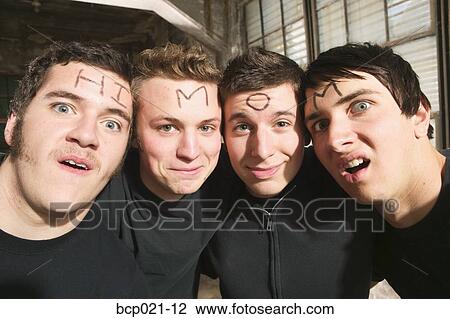 Four young men with the words "Hi Mom" on foreheads View Large Photo Image Stock Image - Four young men with the words "Hi Mom" on foreheads. Fotosearch