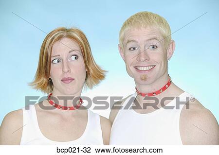 Portrait of a young couple wearing dog collars View Large Photo Image Stock Image - Portrait of a young couple wearing dog collars. Fotosearch