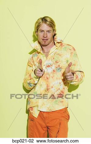 Young man giving the thumbs up sign View Large Photo Image Stock Image - Young man giving the thumbs up sign. Fotosearch