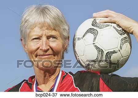 An older female soccer player View Large Photo Image Stock Photo - An older female soccer player. Fotosearch