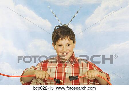 A young boy with antennae on his head View Large Photo Image Stock Photography - A young boy with antennae on his head. Fotosearch