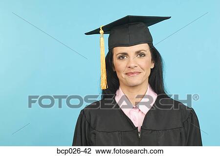 Portrait of woman in cap and gown View Large Photo Image Stock Image - Portrait of woman in cap and gown. Fotosearch