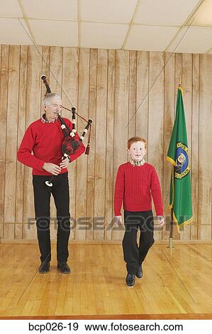 Young boy dancing to bagpipe music View Large Photo Image Stock Photo - Young boy dancing to bagpipe music. Fotosearch