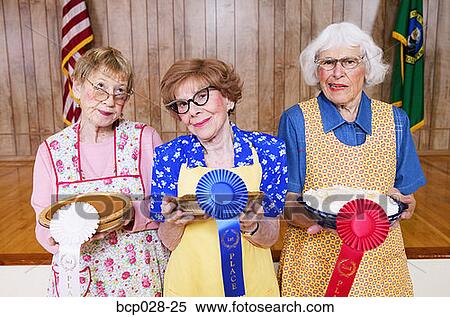 Stock Photography - Women with prizes for homemade pies. Fotosearch