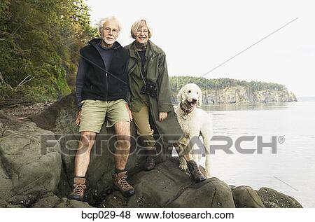 Portrait of a hiking couple View Large Photo Image Stock Photo - Portrait of a hiking couple. Fotosearch